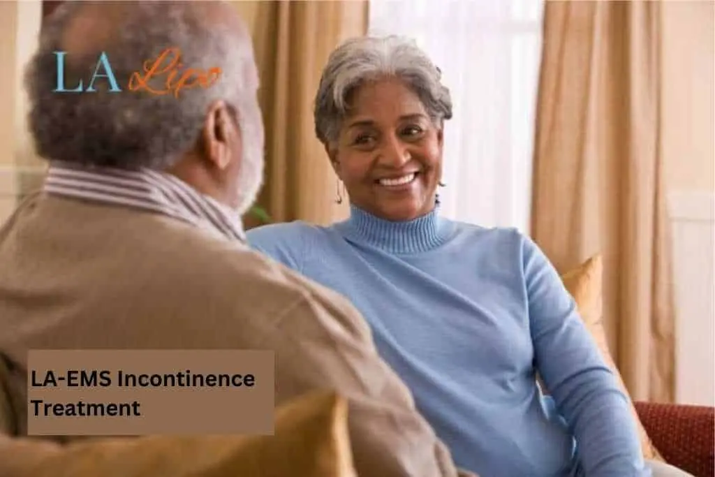 Couple sat smiling at each other - LA-EMS treatment Bedford Park