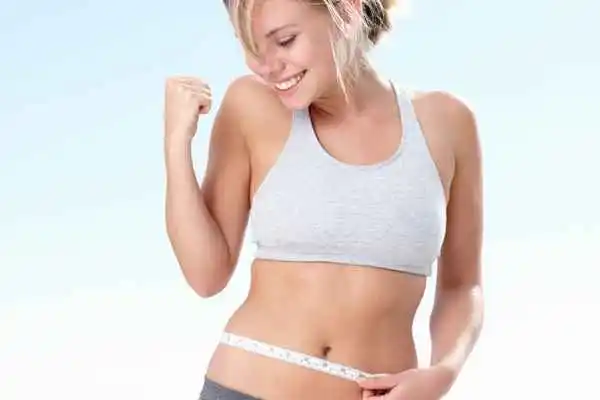 woman happy after fat reduction treatment Bedford Park
